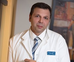 Dr. Christos Tsalikis